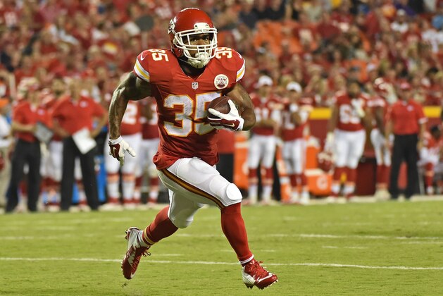 KANSAS CITY, MO - AUGUST 28:  Running back Charcandrick West #35 of the Kansas City Chiefs runs up field against the Tennessee Titans during the second half of a preseason game at Arrowhead Stadium on August 28, 2015 in Kansas City, Missouri.  (Photo by Peter G. Aiken/Getty Images)