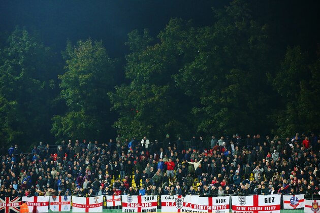 KAUNAS, LITHUANIA - OCTOBER 12:  The travelling England fans show their support during the UEFA EURO 2016 qualifying Group E match between Lithuania and England at LFF Stadionas on October 12, 2015 in Kaunas, Lithuania.  (Photo by Alex Livesey/Getty Images)