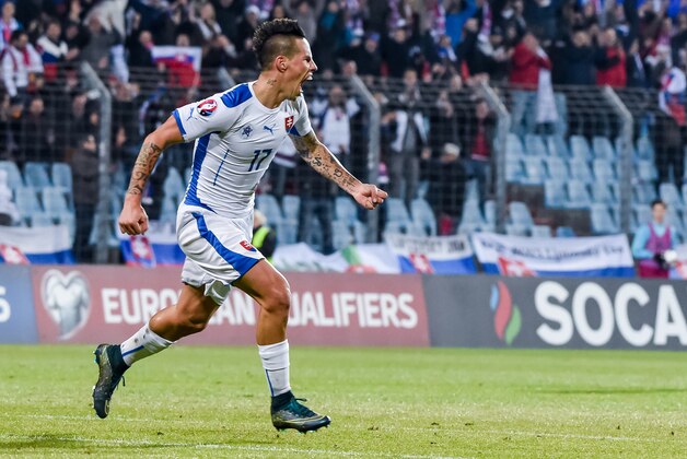 Slovakia's Marek Hamsik celebrates after scoring during a Group C Euro 2016 qualifying soccer match between Luxembourg and Slovakia at the Josy Barthel stadium in Luxembourg on Monday, Oct. 12, 2015. (AP Photo/Geert Vanden Wijngaert)