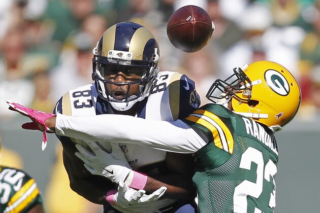 Green Bay Packers' Damarious Randall (23) breaks up a pass intended for St. Louis Rams' Brian Quick during the first half an NFL football game Sunday, Oct. 11, 2015, in Green Bay, Wis. (AP Photo/Matt Ludtke)