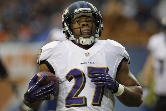 Baltimore Ravens running back Ray Rice (27) rushes for a touchdown during the first half of an NFL football game against the Chicago Bears, Sunday, Nov. 17, 2013, in Chicago. (AP Photo/Nam Y. Huh)