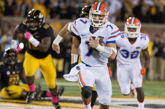 Florida quarterback Will Grier runs upfield during the second half of an NCAA college football game, Saturday, Oct. 10 2015, in Columbia, Mo. Florida won the game 21-3. (AP Photo/L.G. Patterson)