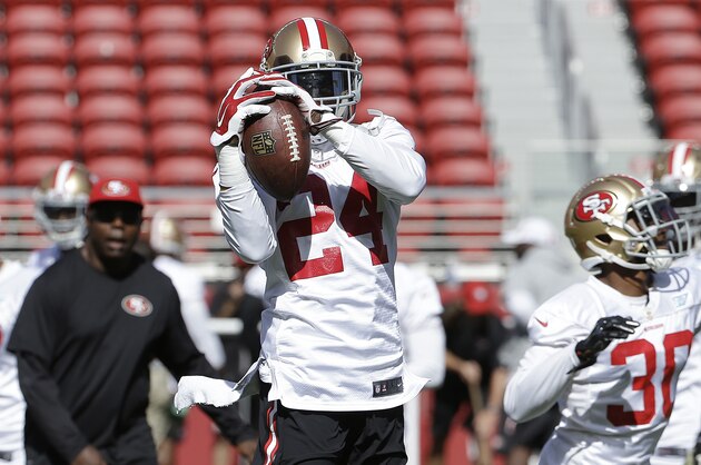 San Francisco 49ers cornerback Shareece Wright catches a pass during the team's NFL football training camp in Santa Clara, Calif., Sunday, Aug. 2, 2015. (AP Photo/Jeff Chiu)