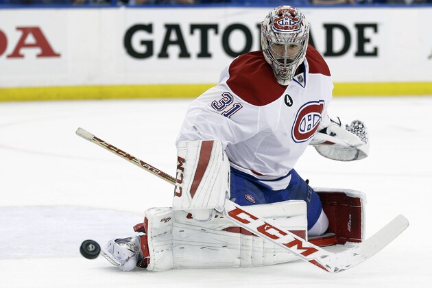 Montreal Canadiens goalie Carey Price (31) makes a save on a shot by the Tampa Bay Lightning during the second period of Game 6 of a second-round NHL Stanley Cup hockey playoff series Tuesday, May 12, 2015, in Tampa, Fla. (AP Photo/Chris O'Meara)