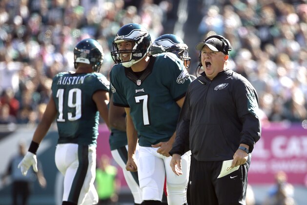 Philadelphia Eagles head coach Chip Kelly, right, and quarterback Sam Bradford react to a call during the first half of an NFL football game against the New Orleans Saints, Sunday, Oct. 11, 2015, in Philadelphia. (AP Photo/Michael Perez)