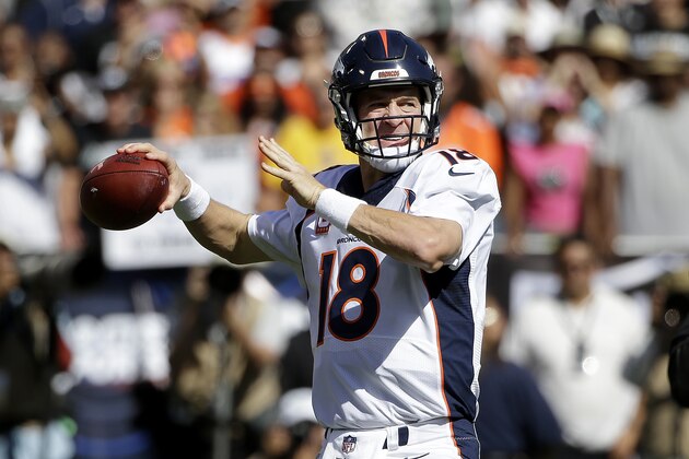 Denver Broncos quarterback Peyton Manning (18) against the Oakland Raiders during the first half of an NFL football game in Oakland, Calif., Sunday, Oct. 11, 2015. (AP Photo/Marcio Jose Sanchez)