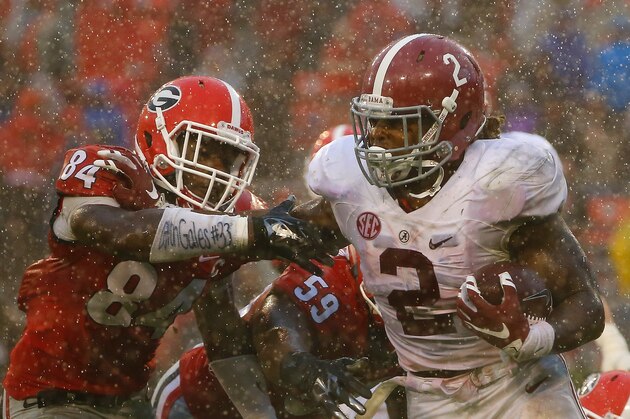 ATHENS, GA - OCTOBER 03:  Derrick Henry #2 of the Alabama Crimson Tide tries to break a tackle by Leonard Floyd #84 of the Georgia Bulldogs at Sanford Stadium on October 3, 2015 in Athens, Georgia.  (Photo by Kevin C. Cox/Getty Images)