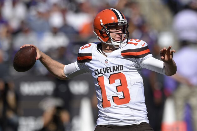 Cleveland Browns quarterback Josh McCown throws to a receiver in the first half of an NFL football game against the Baltimore Ravens, Sunday, Oct. 11, 2015, in Baltimore. (AP Photo/Nick Wass)