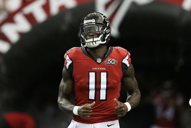 Atlanta Falcons wide receiver Julio Jones (11)  takes the field before the first half of an NFL football game between the Atlanta Falcons and the Washington Redskins, Sunday, Oct. 11, 2015, in Atlanta. (AP Photo/Brynn Anderson)