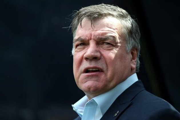 FILE - In this Sunday, May 24, 2015 file photo, Sam Allardyce waits at the start of their English Premier League soccer match between Newcastle United and West Ham United's  at St James' Park, Newcastle, England. Sunderland says it has hired Sam Allardyce as its new manager on a two-year contract. Allardyce replaces Dick Advocaat after the Dutchman quit last weekend following a 2-2 draw at home to West Ham. Sunderland surrendered a two-goal lead in the game and has only three points from eight matches so far in the Premier League, leaving it second from bottom in the standings. Allardyce says “I hope to be able to help to bring the stability and success that everyone wants.” (AP Photo/Scott Heppell, file)