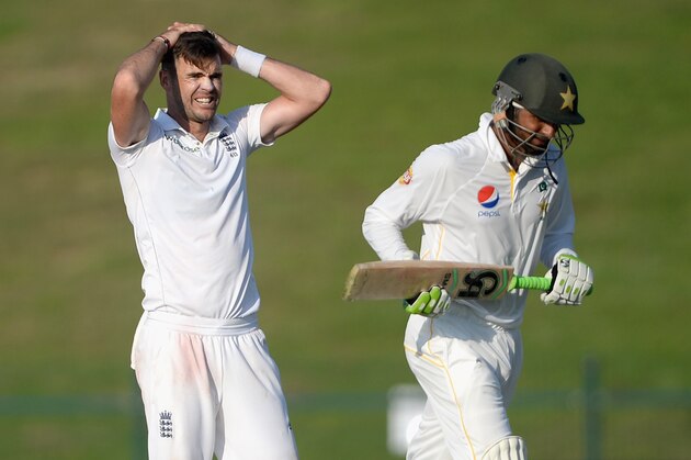 ABU DHABI, UNITED ARAB EMIRATES - OCTOBER 13:  James Anderson of England reacts as Shoaib Malik of Pakistan scores runs during the 1st Test between Pakistan and England at Zayed Cricket Stadium on October 13, 2015 in Abu Dhabi, United Arab Emirates.  (Photo by Gareth Copley/Getty Images)