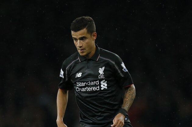 Liverpool's Philippe Coutinho controls the ball during the English Premier League soccer match between Arsenal and Liverpool at Emirates stadium in London, Monday, Aug. 24, 2015. (AP Photo/Kirsty Wigglesworth)