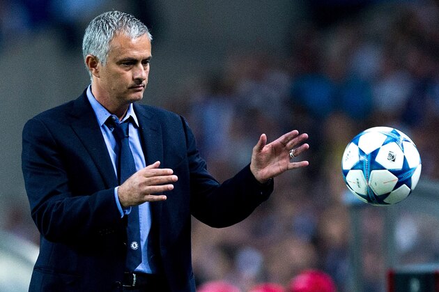PORTO, PORTUGAL - SEPTEMBER 29:  head coach Jose Mourinho of Chelsea FC holds the ball during the UEFA Champions League Group G match between FC Porto and Chelsea FC  at Estadio do Dragao on September 29, 2015 in Porto, Portugal.  (Photo by Gonzalo Arroyo Moreno/Getty Images)
