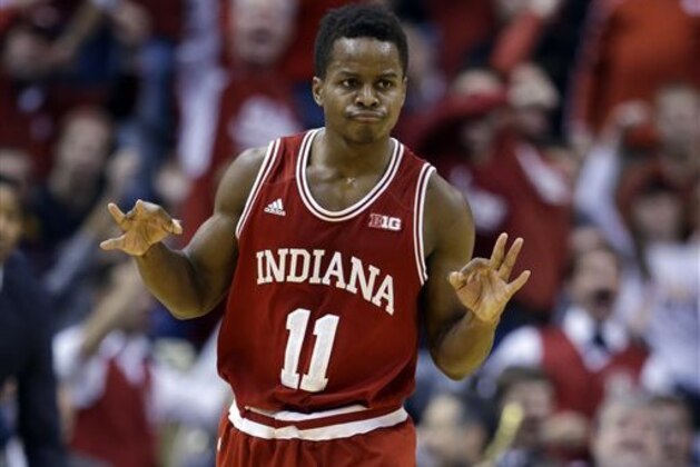 FILE - In this Dec. 20, 2014, file photo, Indiana guard Yogi Ferrell reacts after hitting a 3-point basket against the Butler during an NCAA college basketball game in Indianapolis. The Hoosiers and Fighting Irish are among 27 Division I teams that have taken two-point jumpers _defined by shot tracking site Hoop-math.com as anything other than a layup, tip-in, dunk or 3-pointer _ on less than 20 percent of their attempts. (AP Photo/Michael Conroy, File)