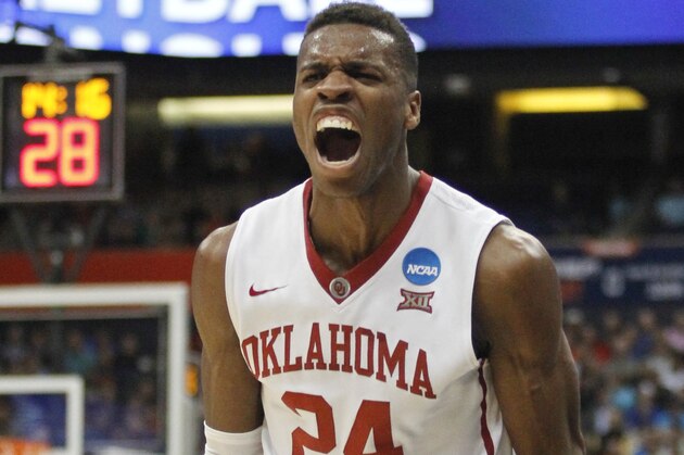 Oklahoma's Buddy Hield reacts during the first half of a regional semifinal against the Oklahoma in the NCAA men's college basketball tournament Friday, March 27, 2015, in Syracuse, N.Y. (AP Photo/Nick Lisi)