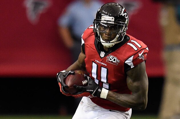 Oct 11, 2015; Atlanta, GA, USA; Atlanta Falcons wide receiver Julio Jones (11) runs after a catch against the Washington Redskins during the fourth quarter at the  Georgia Dome. The Falcons defeated the Redskins 25-19 in overtime. Mandatory Credit: Dale Zanine-USA TODAY Sports