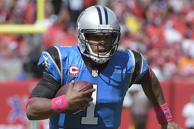 Carolina Panthers quarterback Cam Newton runs against the Tampa Bay Buccaneers during the third quarter of an NFL football game Sunday, Oct. 4, 2015, in Tampa, Fla. (AP Photo/Phelan M. Ebenhack)