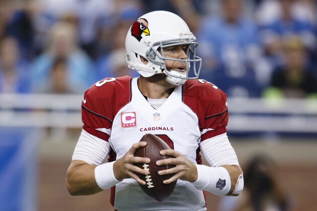Arizona Cardinals quarterback Carson Palmer (3) drops back to pass against the Detroit Lions during an NFL football game at Ford Field in Detroit, Sunday, Oct. 11, 2015. (AP Photo/Rick Osentoski)