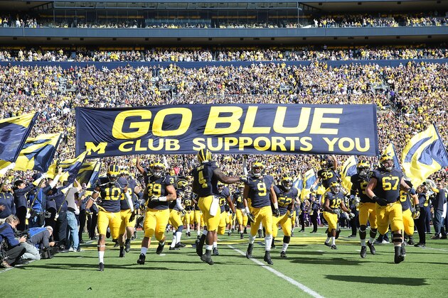 ANN ARBOR MI - OCTOBER 10: The Michigan Wolverines take the field prior to the start of the game against the Northwestern Wildcats on October 10, 2015 at Michigan Stadium in Ann Arbor, Michigan. The Wolverines defeated the Wildcats 38-0. (Photo by Leon Halip/Getty Images)