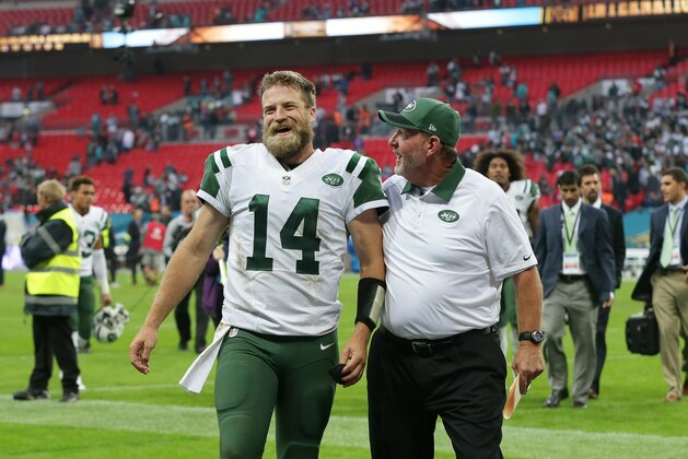 New York Jets' Ryan Fitzpatrick smiles as he leaves the field at the end of the NFL football game between the New York Jets and the Miami Dolphins and at Wembley stadium in London, Sunday, Oct. 4, 2015. The Jets won the match 27-14.   (AP Photo/Tim Ireland)