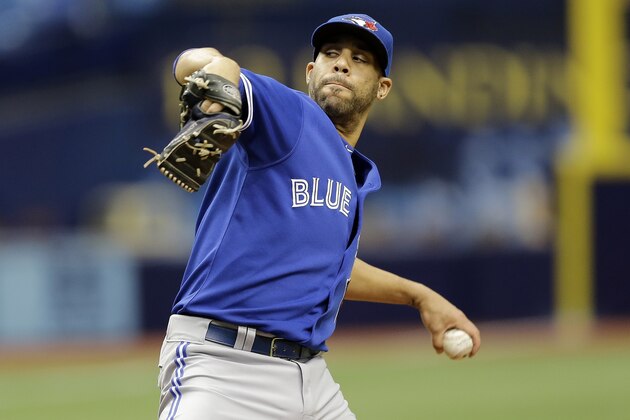 Toronto Blue Jays starting pitcher David Price delivers to Troy Tulowitzki during a simulated game before a baseball game between the Tampa Bay Rays and the Blue Jays Friday, Oct. 2, 2015, in St. Petersburg, Fla.  (AP Photo/Chris O'Meara)