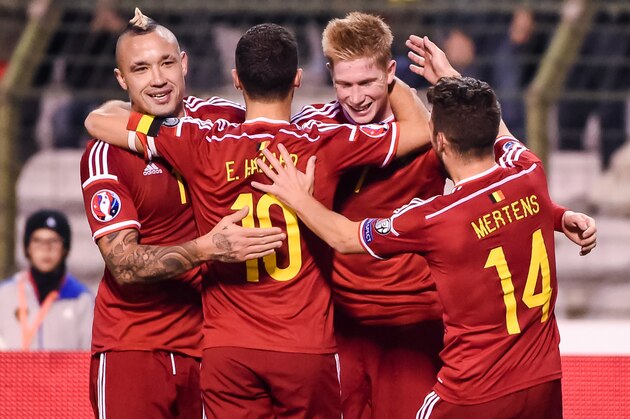 Belgium's Kevin De Bruyne, second right, celebrates with teammates after scoring a goal during a Group B Euro 2016 qualifying soccer match between Belgium and Israel at the King Baudouin stadium in Brussels on Tuesday, Oct. 13, 2015. (AP Photo/Geert Vanden Wijngaert)