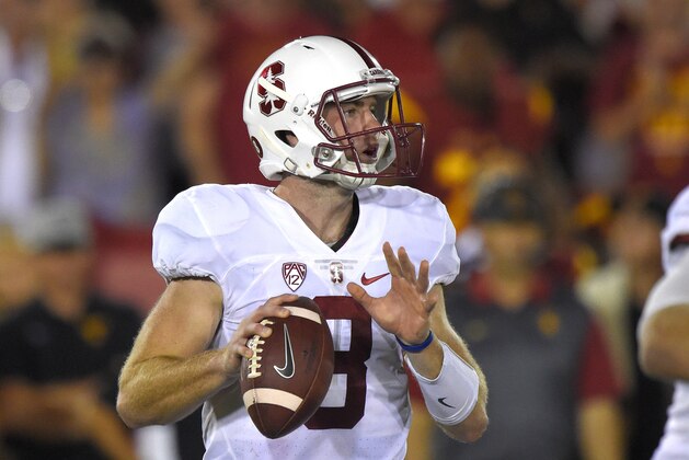 Stanford quarterback Kevin Hogan gets set to pass during the second half of an NCAA college football game against Stanford, Saturday, Sept. 19, 2015, in Los Angeles. Stanford won 41-31. (AP Photo/Mark J. Terrill)