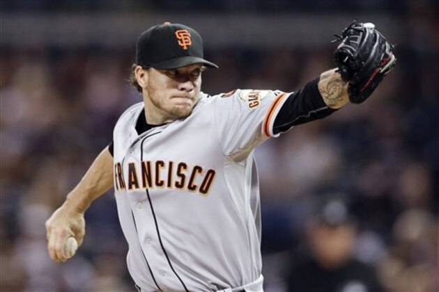 FILE - In this Sept. 23, 2015, file photo, San Francisco Giants starting pitcher Jake Peavy works against a San Diego Padres batter during the first inning of a baseball game in San Diego. California lawmakers have taken the first step toward banning smokeless tobacco in state ballparks. (AP Photo/Gregory Bull, File)