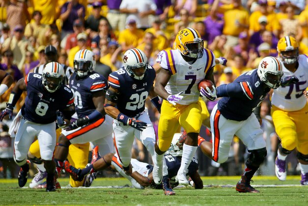 Sep 19, 2015; Baton Rouge, LA, USA; LSU Tigers running back Leonard Fournette (7) runs against the Auburn Tigers during the first quarter of a game at Tiger Stadium. Mandatory Credit: Derick E. Hingle-USA TODAY Sports