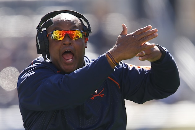 Virginia head coach Mike London works his team during an NCAA college football game, Saturday, Oct. 10, 2015 in Pittsburgh. (AP Photo/Keith Srakocic)