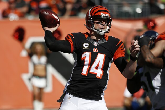 Cincinnati Bengals quarterback Andy Dalton throws in the second half of an NFL football game against the Seattle Seahawks, Sunday, Oct. 11, 2015, in Cincinnati. (AP Photo/Frank Victores)