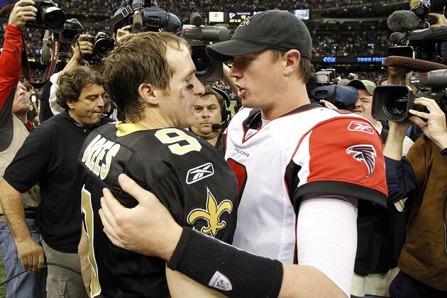 New Orleans Saints quarterback Drew Brees (9) greets Atlanta Falcons quarterback Matt Ryan (2) after their NFL football game in New Orleans, Monday, Dec. 26, 2011. (AP Photo/Bill Haber)