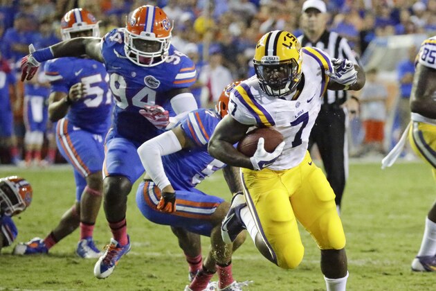 LSU running back Leonard Fournette (7) runs against Florida during the first half of an NCAA college football game in Gainesville, Fla., Saturday, Oct. 11, 2014. (AP Photo/John Raoux)
