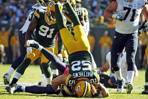 Green Bay Packers' Clay Matthews sacks St. Louis Rams quarterback Nick Foles during the second half an NFL football game Sunday, Oct. 11, 2015, in Green Bay, Wis. The Packers won 24-10. (AP Photo/Mike Roemer)