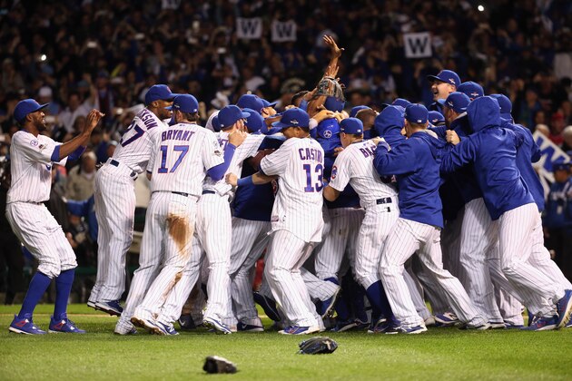 CHICAGO, IL - OCTOBER 13:  The Chicago Cubs celebrate defeating the St. Louis Cardinals 6-4 in game four of the National League Division Series at Wrigley Field on October 13, 2015 in Chicago, Illinois.  (Photo by Jonathan Daniel/Getty Images)