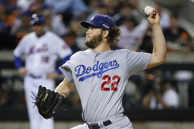 Los Angeles Dodgers pitcher Clayton Kershaw (22) delivers against the New York Mets during the first inning of baseball's Game 4 of the National League Division Series, Tuesday, Oct. 13, 2015, in New York. (AP Photo/Kathy Willens)