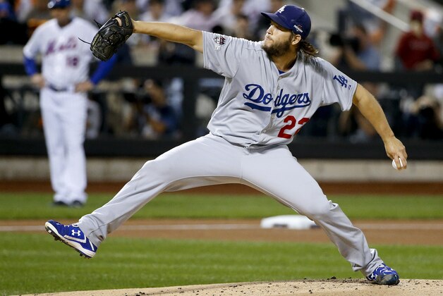 Los Angeles Dodgers pitcher Clayton Kershaw (22) delivers against the New York Mets during the first inning of baseball's Game 4 of the National League Division Series, Tuesday, Oct. 13, 2015, in New York. (AP Photo/Kathy Willens)