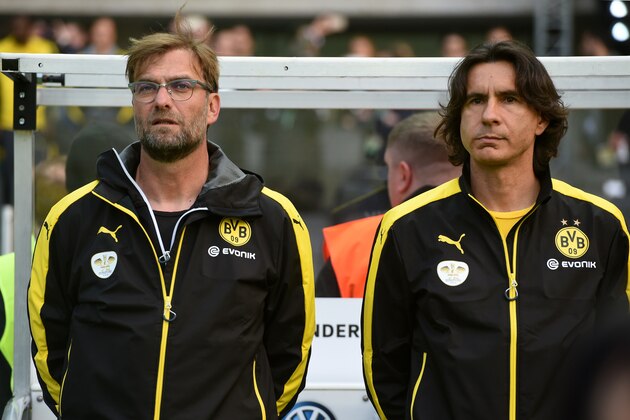 Dortmund's head coach Juergen Klopp (L) and assistant coach Zeljko Buvac (R) stand on the pitch before the German Cup DFB Pokal final football match between BVB Borussia Dortmund and VfL Wolfsburg at the Olympic Stadium in Berlin on May 30, 2015.  AFP PHOTO / PATRIK STOLLARZ        (Photo credit should read PATRIK STOLLARZ/AFP/Getty Images)