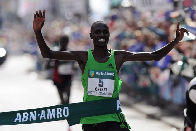 Wilson Chebet of Kenya reacts as he crosses the finish line to win the Rotterdam Marathon, in Rotterdam, Netherlands, Sunday, April 10, 2011.(AP photo/Ermindo Armino)