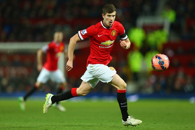 MANCHESTER, ENGLAND - FEBRUARY 03: Paddy McNair of Manchester United on the ball during the FA Cup Fourth round replay match between Manchester United and Cambridge United at Old Trafford on February 3, 2015 in Manchester, England.  (Photo by Clive Mason/Getty Images)