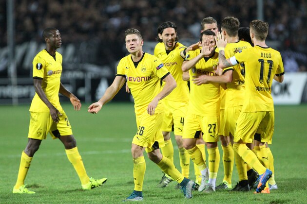 Dortmund's players celebrate after scoringduring the UEFA Europa League group C football match between PAOK FC and Borussia Dortmund at the Stadio Toumba in Thessaloniki on October 1, 2015. The match in a 1-1 draw. AFP PHOTO / SAKIS MITROLIDIS        (Photo credit should read SAKIS MITROLIDIS/AFP/Getty Images)