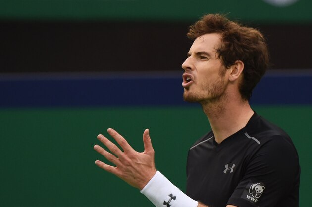 Andy Murray of Britain reacts after a point during his men's singles second round match against Steve Johnson of the US at the Shanghai Masters tennis tournament in Shanghai on October 14, 2015. AFP PHOTO / GREG BAKER        (Photo credit should read GREG BAKER/AFP/Getty Images)