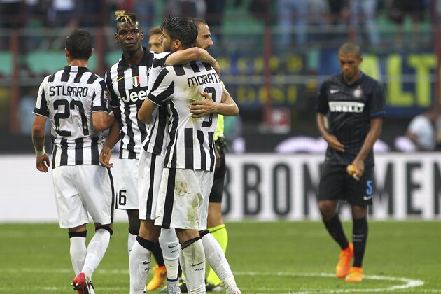 MILAN, ITALY - MAY 16:  Leonardo Bonucci and Alvaro Morata of Juventus FC celebrate a victory at the end of the Serie A match between FC Internazionale Milano and Juventus FC at Stadio Giuseppe Meazza on May 16, 2015 in Milan, Italy.  (Photo by Marco Luzzani/Getty Images)