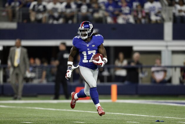 New York Giants' Dwayne Harris (17) carries the ball during the first half of an NFL football game against the Dallas Cowboys Sunday, Sept. 13, 2015, in Arlington, Texas. (AP Photo/Brandon Wade)
