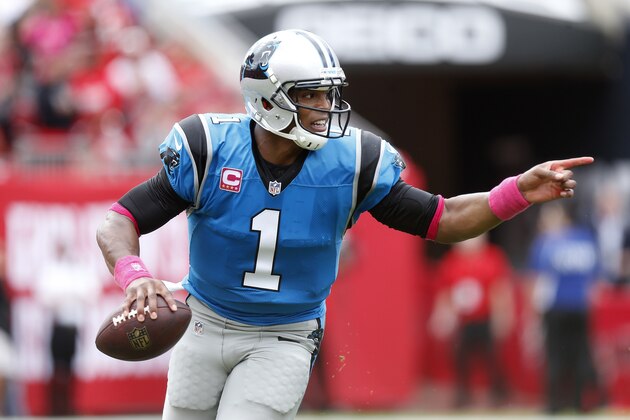 Carolina Panthers quarterback Cam Newton runs against the Tampa Bay Buccaneers during the second quarter of an NFL football game Sunday, Oct. 4, 2015, in Tampa, Fla. (AP Photo/Brian Blanco)