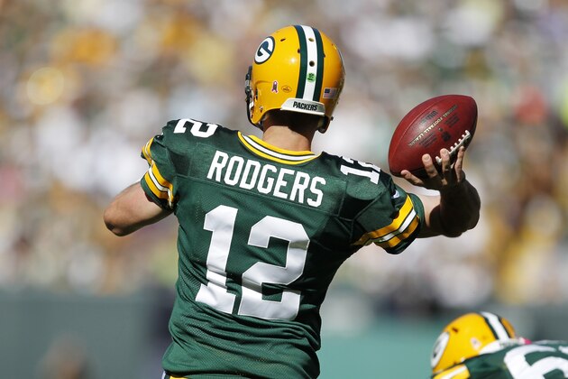 Green Bay Packers' Aaron Rodgers throws during the first half an NFL football game against the St. Louis Rams Sunday, Oct. 11, 2015, in Green Bay, Wis. (AP Photo/Matt Ludtke)