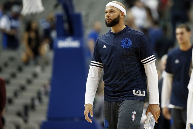 Dallas Mavericks guard Deron Williams walks off the court after an NBA preseason basketball game against the Denver Nuggets Tuesday, Oct. 6, 2015, in Dallas. (AP Photo/Tony Gutierrez)
