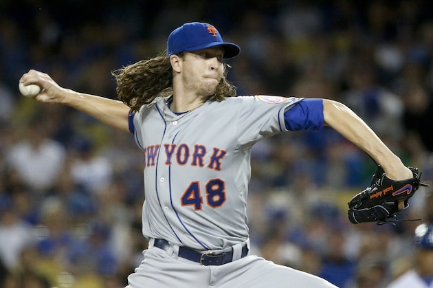 New York Mets starting pitcher Jacob deGrom throws against the Los Angeles Dodgers during the first inning in Game 1 of baseball's National League Division Series, Friday, Oct. 9, 2015 in Los Angeles. (AP Photo/Lenny Ignelzi)
