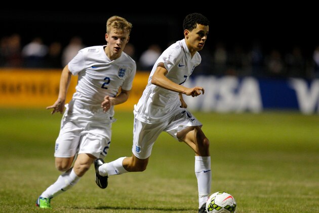 SARASOTA, FL - NOVEMBER 28:  Nathan Holland #7 and James Yates #2 of England against the United States during the Nike International Friendlies at The Premier Sports Campus at Lakewood Ranch on November 28, 2014 in Sarasota, Florida. (Photo by Mike Carlson/Getty Images)