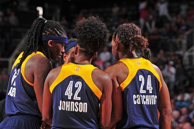 PHOENIX, AZ - AUGUST 16:  Tamika Catchings #24 of the Indiana Fever huddles her team up during the game against the Phoenix Mercury on August 16, 2015 at the Talking Stick Resort Arena in Phoenix, Arizona. NOTE TO USER: User expressly acknowledges and agrees that, by downloading and or using this Photograph, user is consenting to the terms and conditions of the Getty Images License Agreement. Mandatory Copyright Notice: Copyright 2015 NBAE (Photo by Barry Gossage/NBAE via Getty Images)